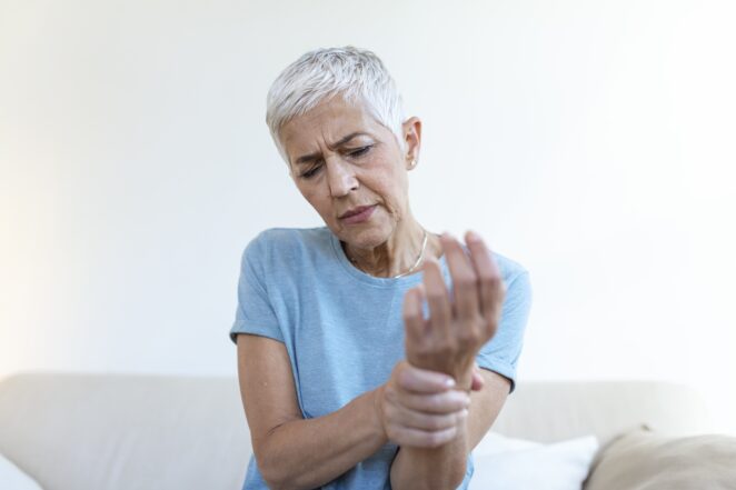 elderly-woman-suffering from hand-arthritis